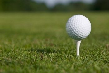 Golf: 18 Holes and Range Balls Plus Tuition For Two or Four from £12 (Up to 54% Off*)