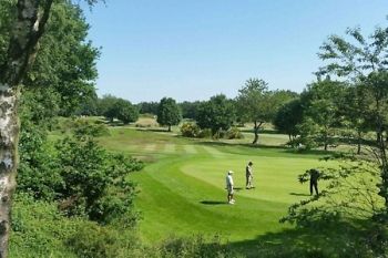 Hillsborough Golf Club: 18 Holes With Range Balls and Coffee For Two or Four from £11.90 (Up to 77% Off)